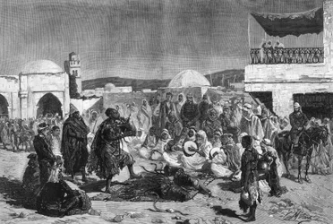 En ormtjusare på Souk-torget i Beja i Tunisien