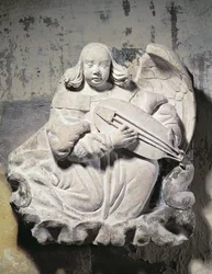 Ängelmusiker spelar ett stränginstrument (basrelief)