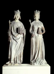 Art France: Statyer av kungen av Frankrike Karl V känd som Karl den vise (1338-1380) och Frankrikes drottning Jeanne de Bourbon (1337-1378). Skulptur i kalksten från 1300-talet. Förmodligen från fasaden på den östra ingången till Louvren (dekor