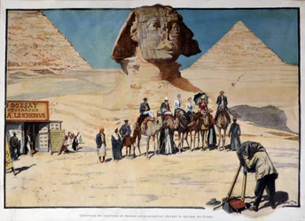Karavan av turister som fotograferas framför Gizeh sfinxen (Guiseh, Giza, Giza)