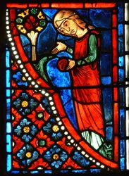 Detalj från ett fönster som visar scener från den heliga Maria den egyptiska livet