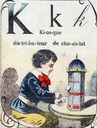 Bokstaven K: chokladautomatkiosk. Gravyr i "ABC des joux pour petits boys". Avbildning av Pont-a-Mousson, Louis Vagne, tryckare-förlag, sent 1800-tal. Mått: 32,5x25 cm