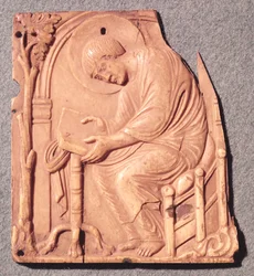 Relief av en munk som studerar, från Hotel de Lunaret, 800-1100-talet