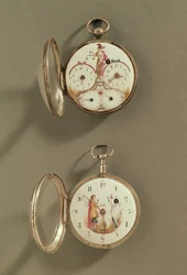 Två fickur dekorerade med revolutionära symboler (metall & emalj)