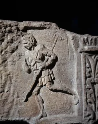 Art Gallo Romain: stele som representerar en gladiator. 50 f.Kr.-100 e.Kr. Metz. Museum of Fine Arts