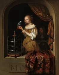 En kvinna som matar en papegoja, med en sida, 1666.