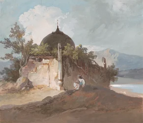 Figur som sitter vid ett indiskt tempel
