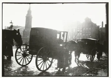 Vagnar på Dam-torget i Amsterdam