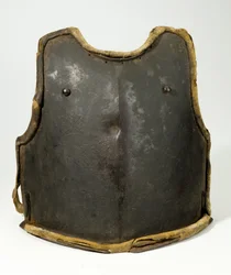Bröstskydd, ca 1650-1700 (stål, färg, läder och tyg)