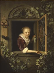 Ung kvinna vid fönstret med en klase druvor, 1622