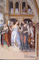 Florent skickade prostituerade till klostret (Florenzo skickar kurtisaner till klostret St. Benedictus) Detaljfresk av klosterbrodern realiserad av Antonio Bazzi dit il Sodoma (1477 - 1549) som berättar om livet för Saint Benedictus (480 - 567) ordensgrund