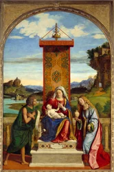 Jungfrun har ett barn mellan Johannes Döparen och Maria Magdalena. Målning av Cima Da Conegliano (1459-1517)