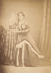 [La Comtesse at Table Holding Fan], 1860-talet.