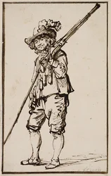 En stående soldat med en musköt över axeln