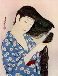 En japansk kvinna som kammar sitt hår, 1920-1930