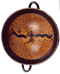 Grekisk konst: Jonisk kopp i keramik med svarta figurer känd som "" kopp med fågeln"" En man jagar svalor. 550 f.Kr. Sön 0,23 m Paris, Louvren