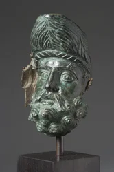 Fartygspip i form av huvudet på Herakles (brons)