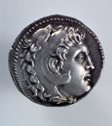 Alexander den stores tetradrakm med Herakles huvud med en huvudbonad av lejonskinn