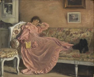 Carola sitter i soffan, 1899
