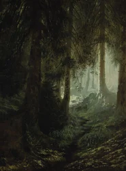 Hjort i ett skogslandskap
