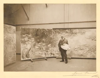 Claude Monet (1840-1926) framför sina målningar "Näckrosorna", i sin ateljé i Giverny