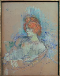 Kvinna sitter