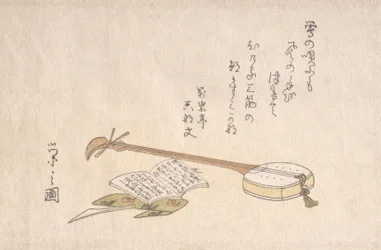Shamisen, Plectrum och en bok.