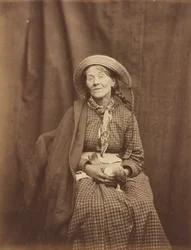 Kvinna håller i en död fågel, Surrey County Asylum,ca. 1855 (foto)