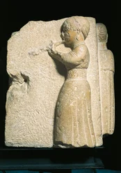 Spanien, Osuna (Urso), Basrelief föreställande en aulosspelare
