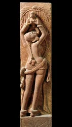 Indisk konst: stuckrelief som föreställer en mor och hennes barn. Kushanperioden (Kouchan eller Kushan), 1:a århundradet. New Delhi, Nationalmuseet.