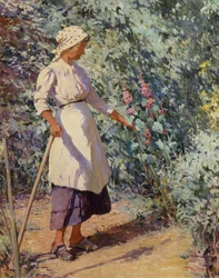 Kvinna i en trädgård