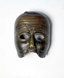 Bronsmask av "Commedia dell