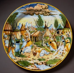Judar i öknen (eller insamlingen av manna). Gud föder israeliterna, som annars skulle svälta, med vaktelägg och manna (Manna). Keramiktallrik från Fontana-verkstaden i Urbino, Italien. Omkring 1560. Museo Nazionale del Bargello, Florens