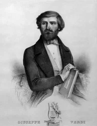 Porträtt av den italienske kompositören Giuseppe Verdi (1813 - 1901) 1844 med noten av operan "" I due foscari"".