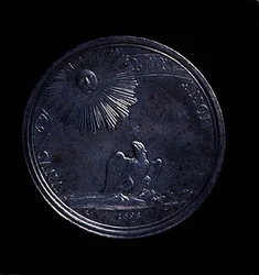 Baksidan av en porträttmedalj av Anna Isabella av Mantua föreställande en örn som observerar solen, präglad 1698. Inskription: VNVS AMOR (silver) (för framsidan se 119199)