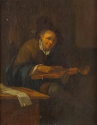 Man spelar en fiol
