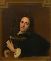 En ung man vid ett stenfönster spelar teorbo-luta