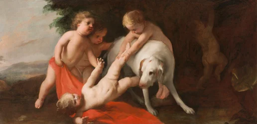 Putti leker med hunden