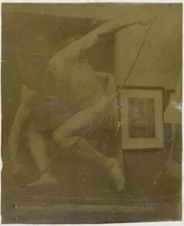 Studie av en manlig nakenmodell hukande med en rosett i handen i Jacques de Lalaings studio