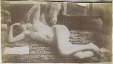 Studie av en kvinnlig nakenmodell, liggande på ett tigerskinn, i Jacques de Lalaings studio