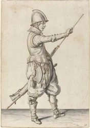 Elegant klädd soldat som stampar på sin kaliver