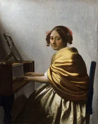 Ung kvinna sittande vid ett virginal, målning av Jan Vermeer (Johannes) (1632-1675), omkring 1670, mått 25,1 x 20 cm, privat samling