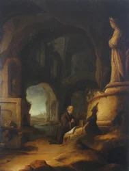 En eremit vid bön i en grotta med klassiska ruiner