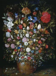 Blommor i ett träkärl