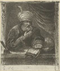 Man med turban bakom ett skrivbord