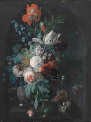 En vas med blommor