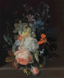 Vas med blommor på en avsats, med en ros, en snöboll, påskliljor och iris