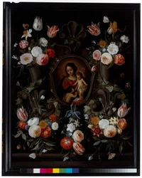 En stenkartouche prydd med blommor och fjärilar