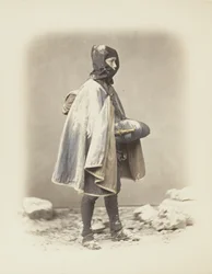 Japansk man i snön (handfärgat svartvitt foto)