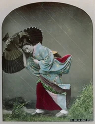 Ung japansk flicka i regnet, ca 1900